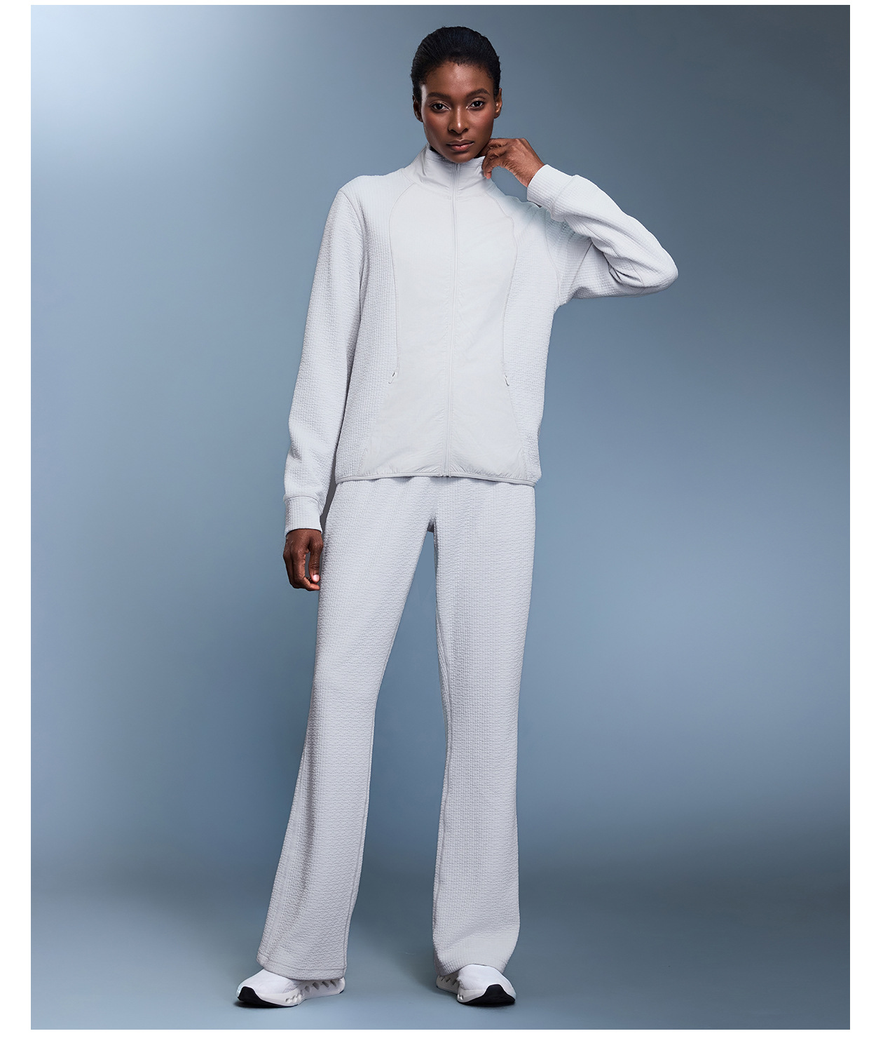 Chaqueta deportiva de mujer estilo casual, corte ajustado tipo waffle, cuello alto y cierre de cremallera (FGBD25164)