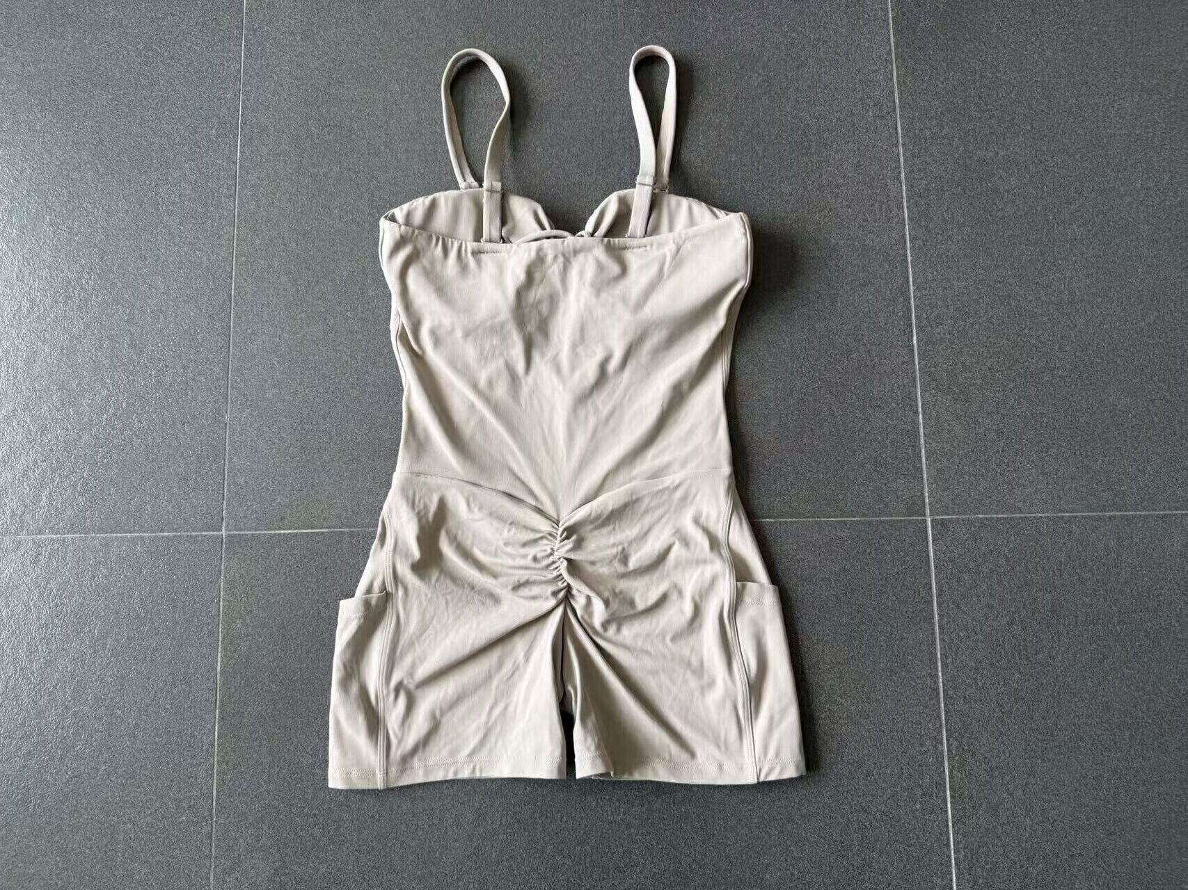 Mono corto de yoga sin mangas para mujer, versátil, con múltiples opciones de uso, para entrenamiento, con bolsillos, FGB15177