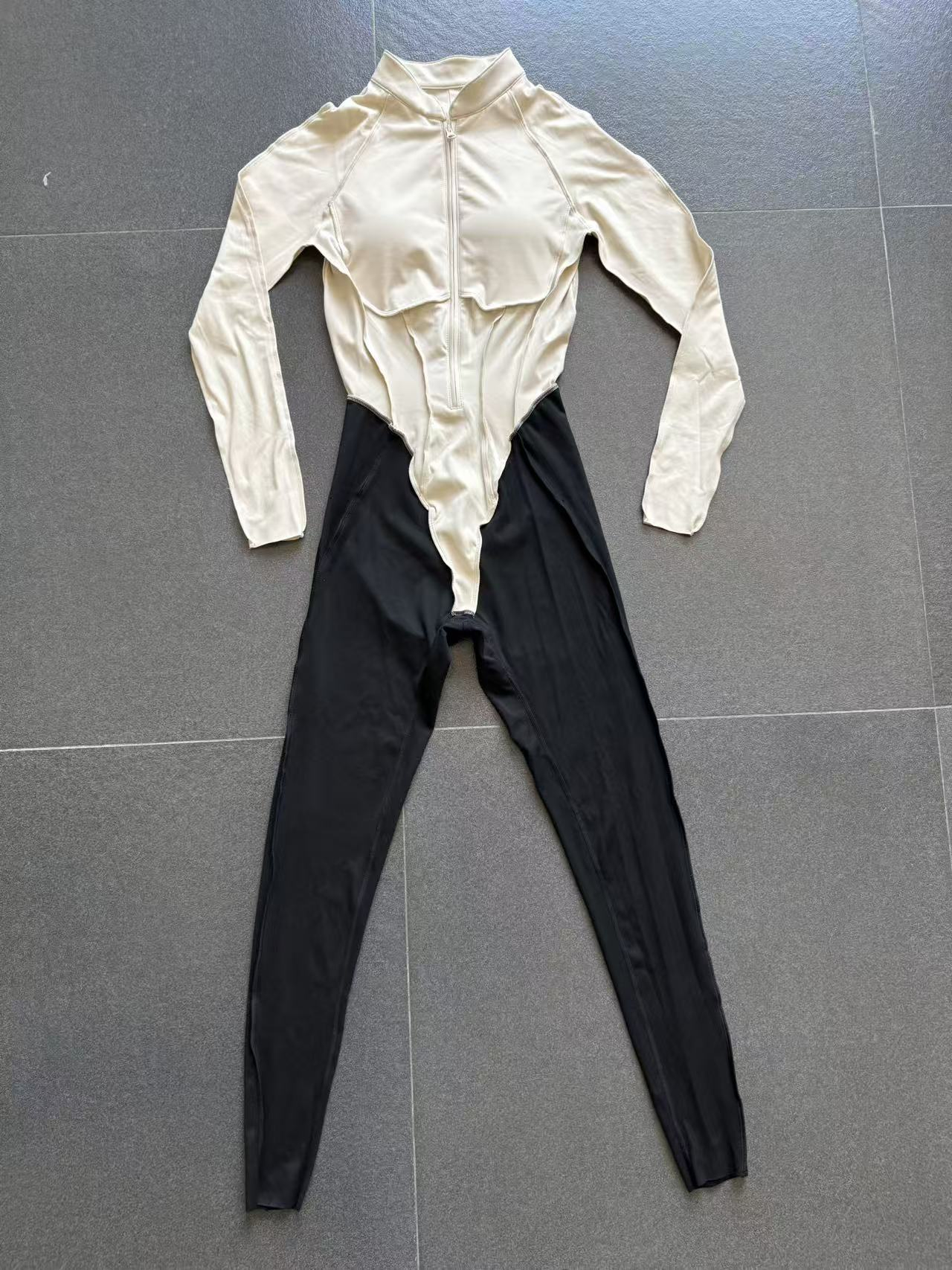 Mono deportivo de manga larga de spandex para mujer, ideal para yoga, gimnasio y entrenamiento, con cremallera FGB16617