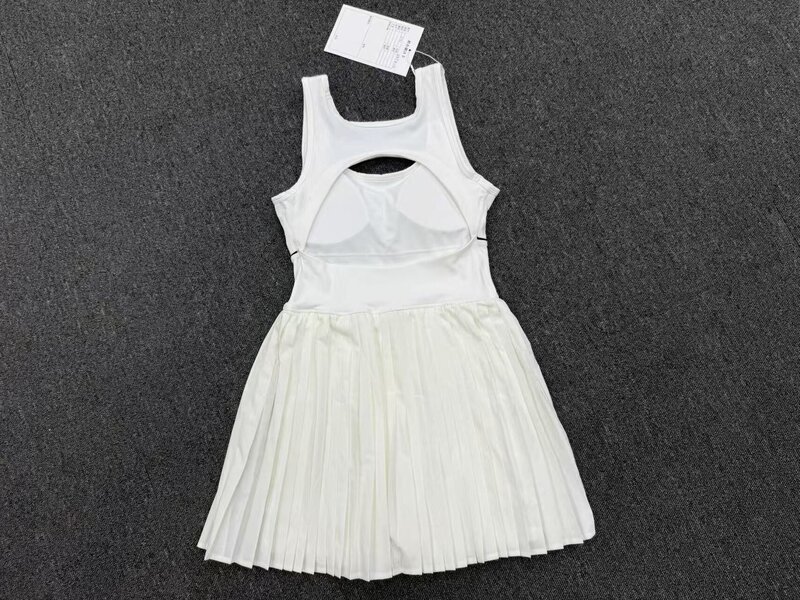 Vestido de tenis de una pieza para mujer: espalda descubierta, cuello cuadrado, falda plisada, shorts integrados, copas acolchadas y tejido de secado rápido (modelo FGBQS21151)