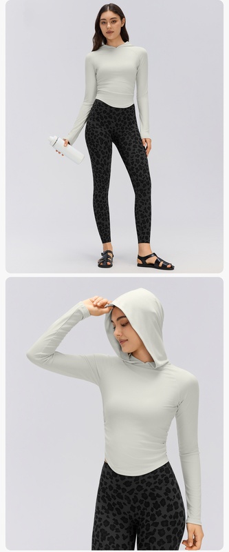 Prenda deportiva para mujer con capucha, manga larga y diseño entallado en la cintura; ideal para correr o practicar Pilates, confeccionada en tejido transpirable (modelo FGBD26135)