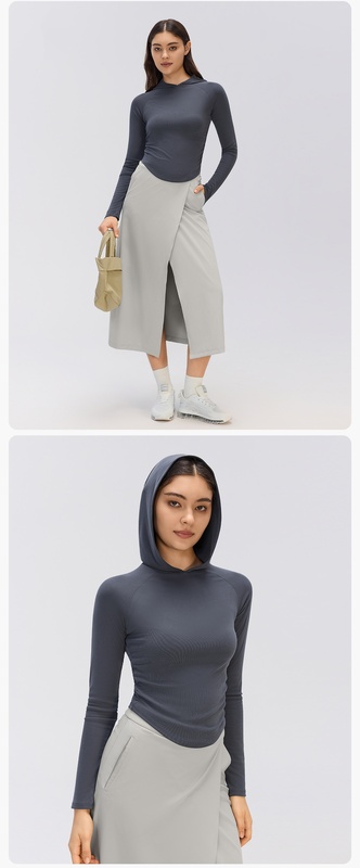 Prenda deportiva para mujer con capucha, manga larga y diseño entallado en la cintura; ideal para correr o practicar Pilates, confeccionada en tejido transpirable (modelo FGBD26135)