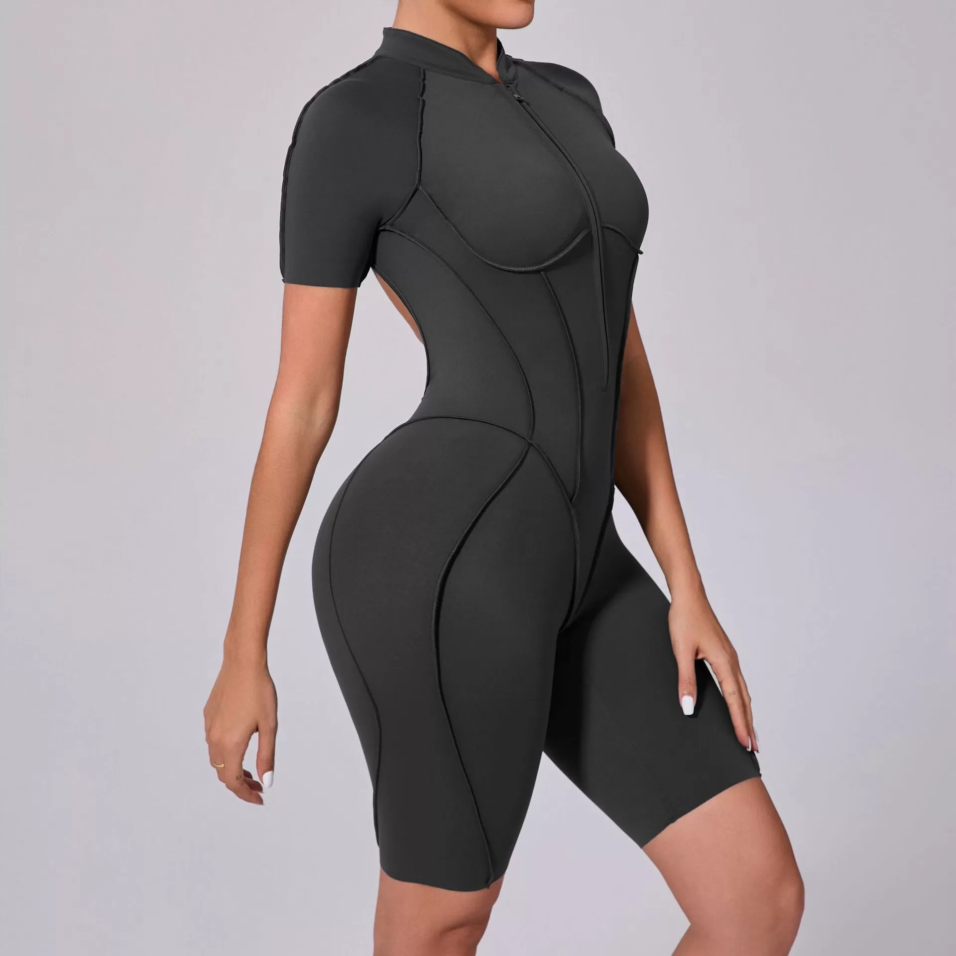 Mono de yoga de una pieza con cremallera y manga corta para mujer FGBK0113