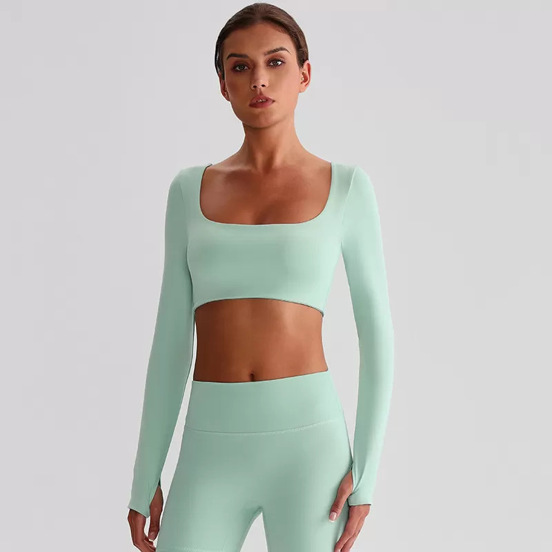 Top de yoga deportivo de manga larga con espalda abierta y corte ajustado para mujer FGB8026