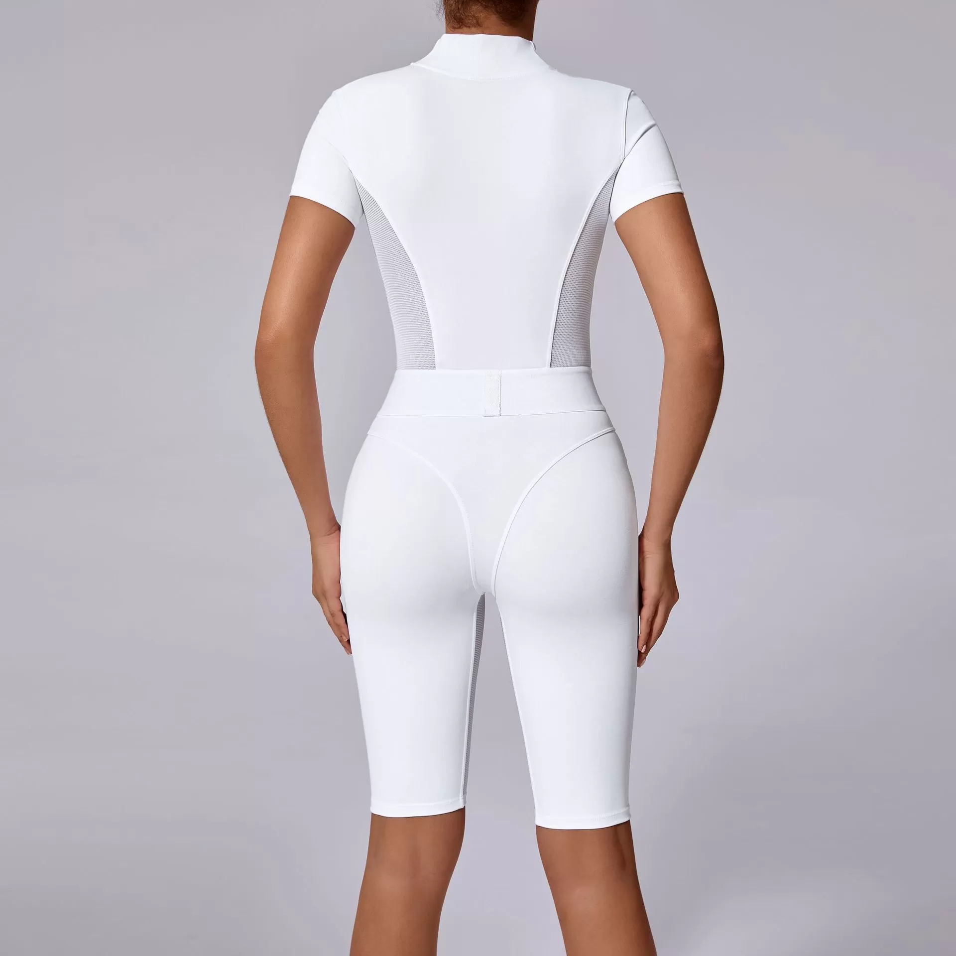 Mono deportivo de manga corta con cremallera para mujer FGB41180