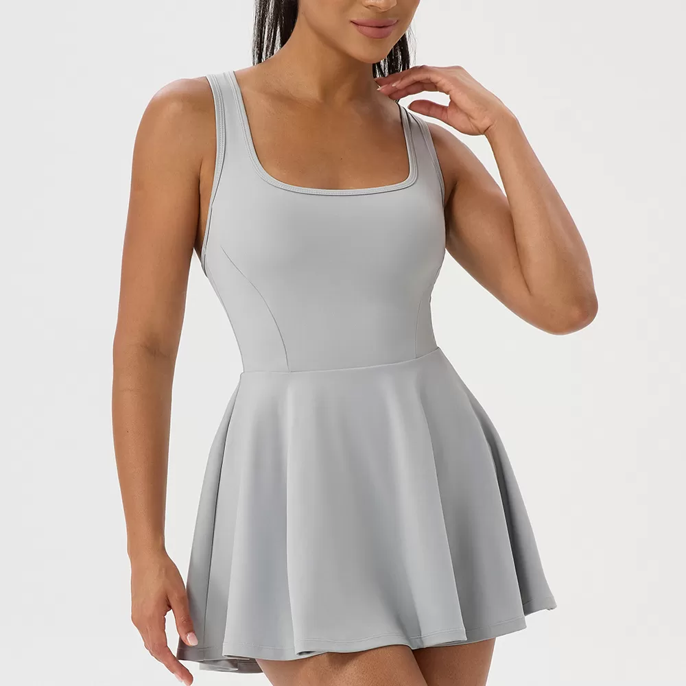 Vestido de tenis con falda plisada y transpirable para mujer FGB52177