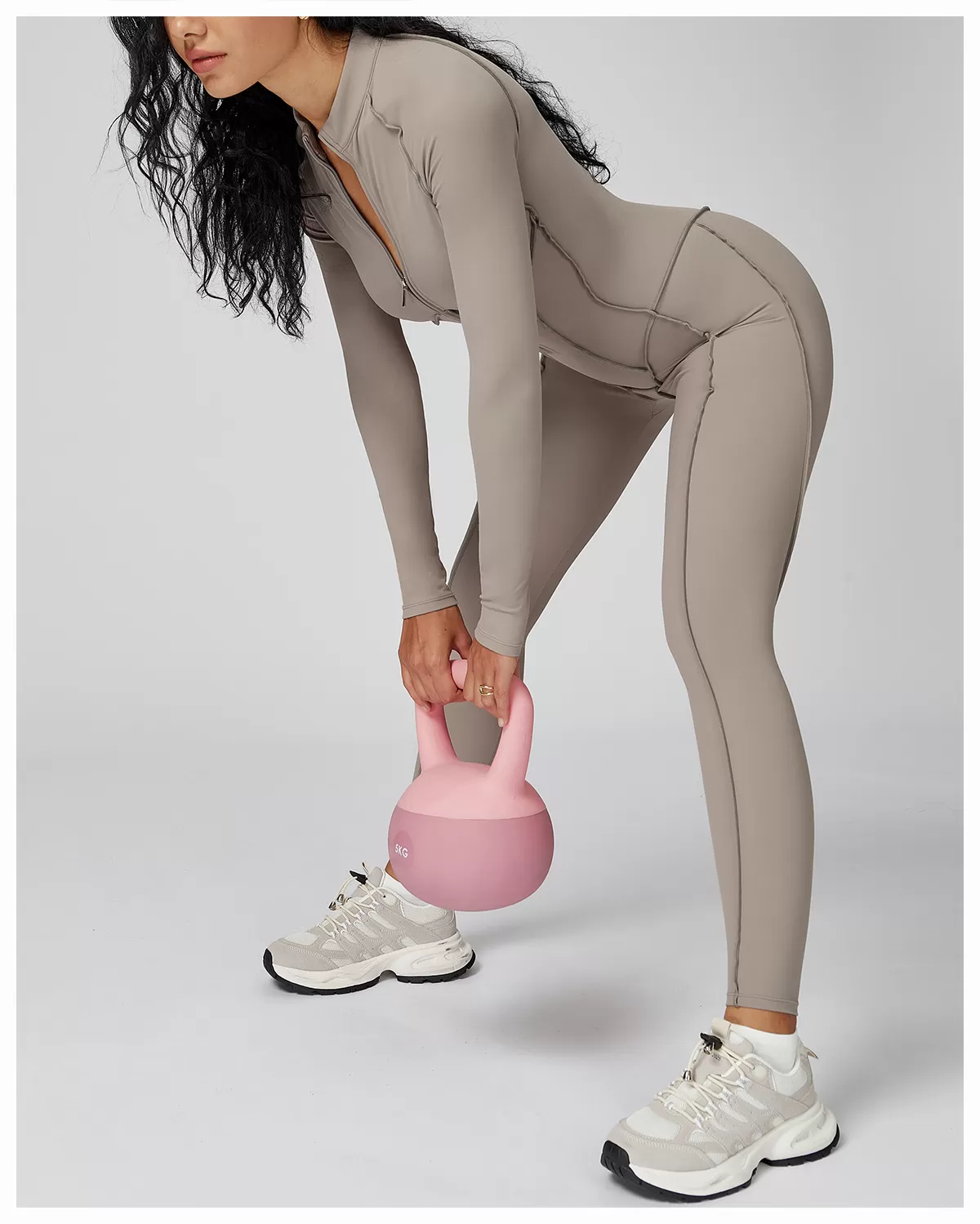 Mono deportivo de una pieza con cremallera y diseno de líneas 3D para gimnasio y yoga FGBELT9326