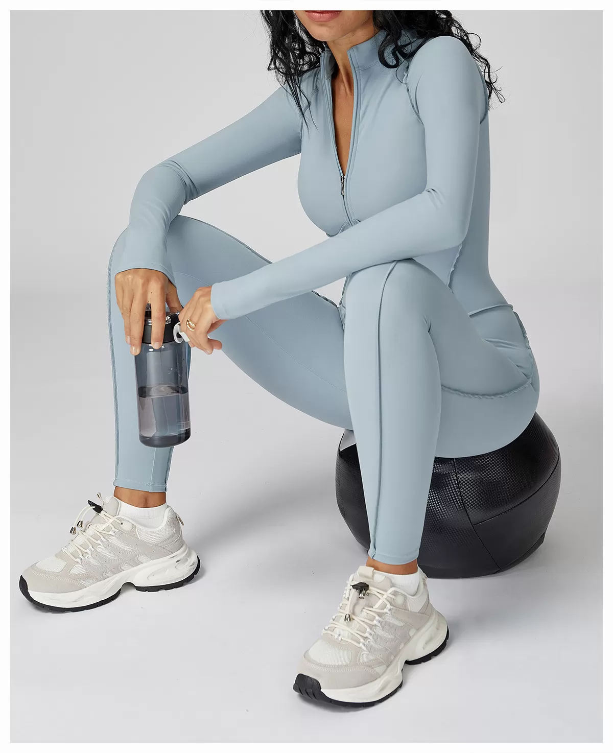 Mono deportivo de una pieza con cremallera y diseno de líneas 3D para gimnasio y yoga FGBELT9326