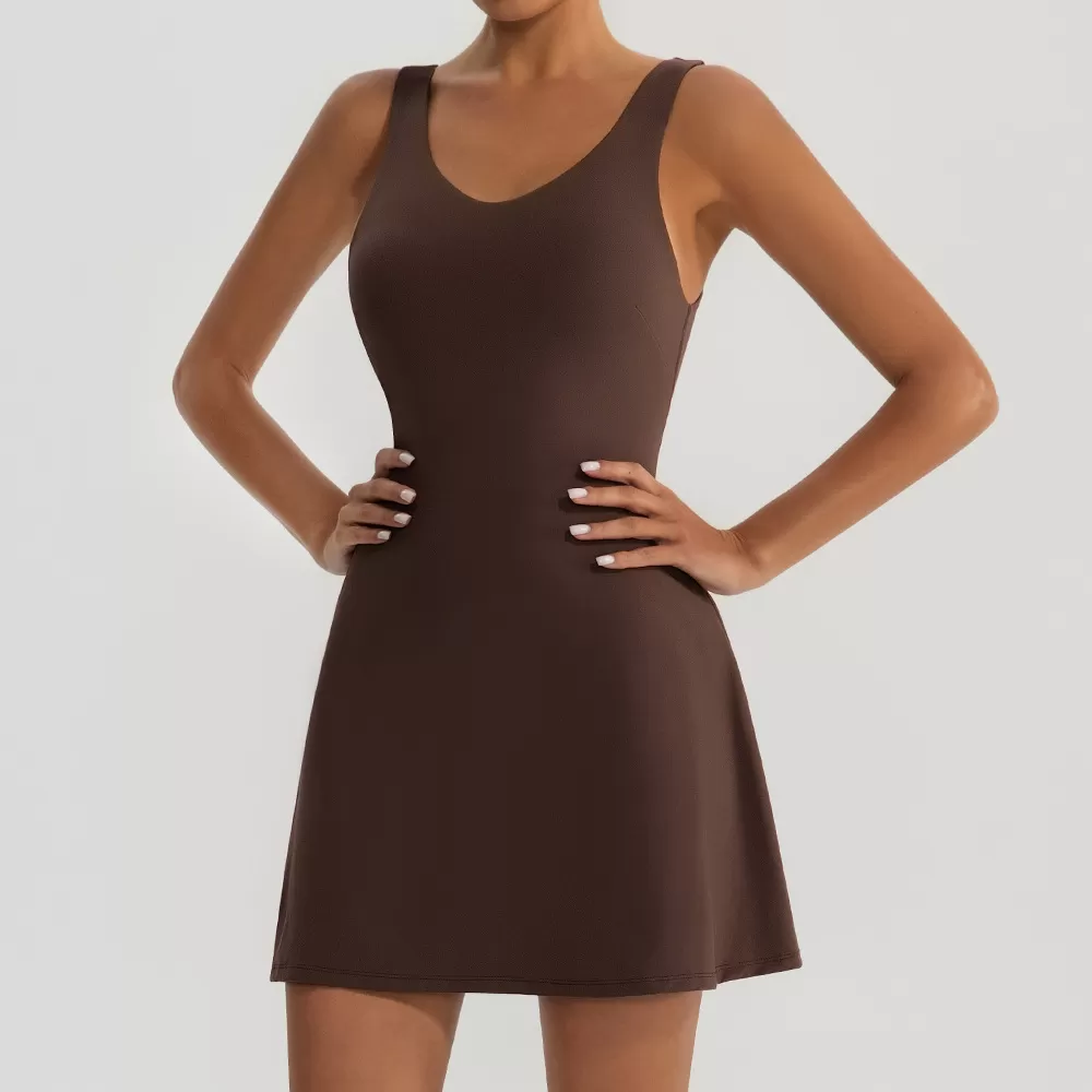 Vestido de tenis sin mangas con logotipo personalizado para mujer, con sujetador incorporado y bolsillos cortos FGBYW1020L