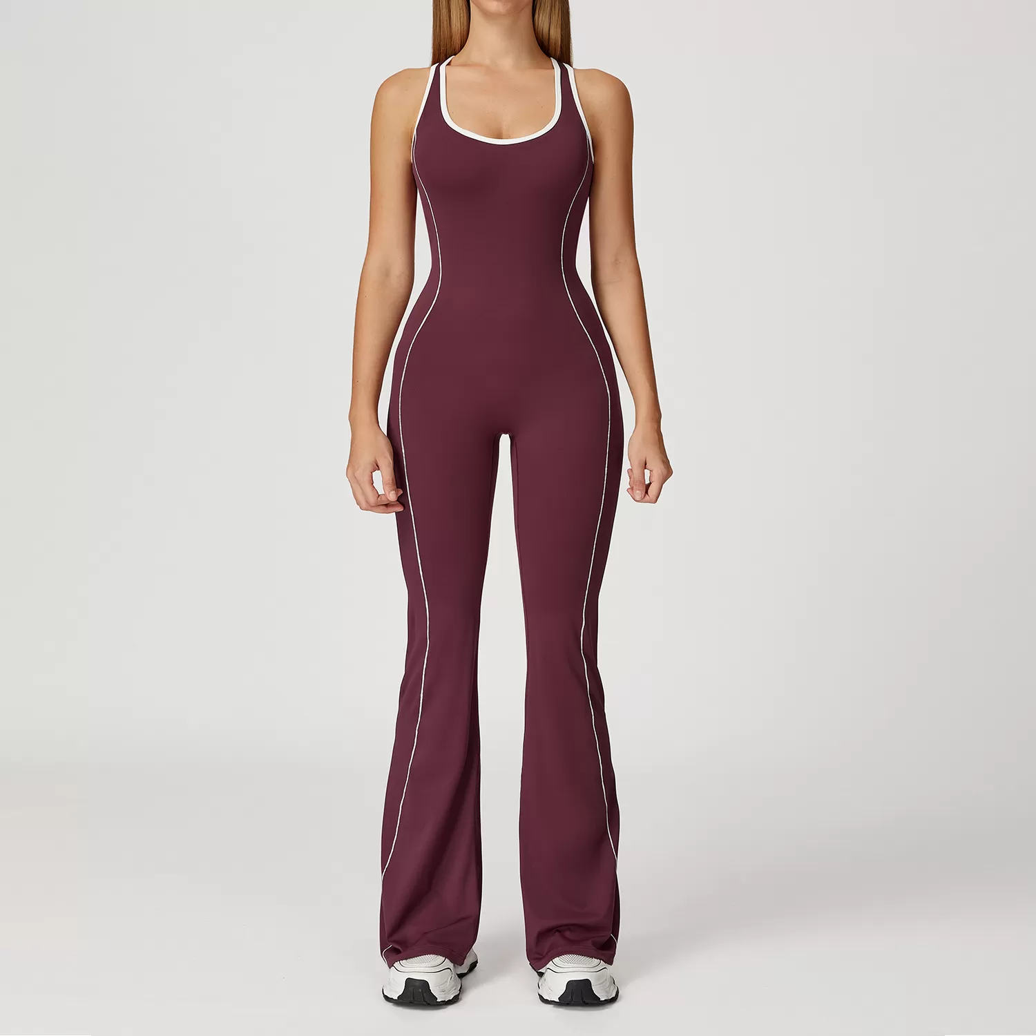 Traje de yoga ajustado al por mayor, mono de una pieza con dobladillo acampanado y control de abdomen para realce de glúteos, FGBDLT5009