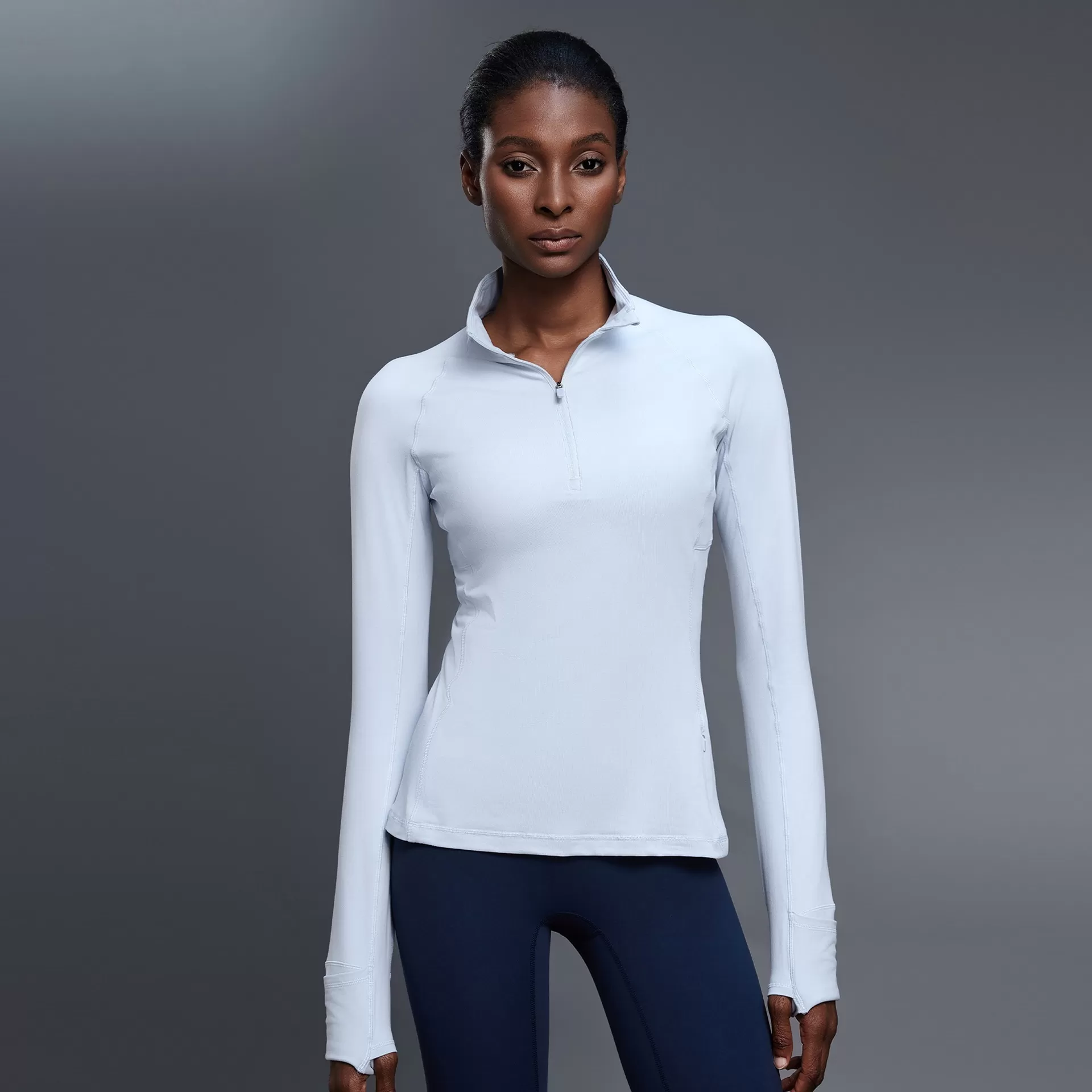 Camiseta de yoga de manga larga con media cremallera para mujer, top deportivo ajustado con aberturas para los pulgares FGBD25150