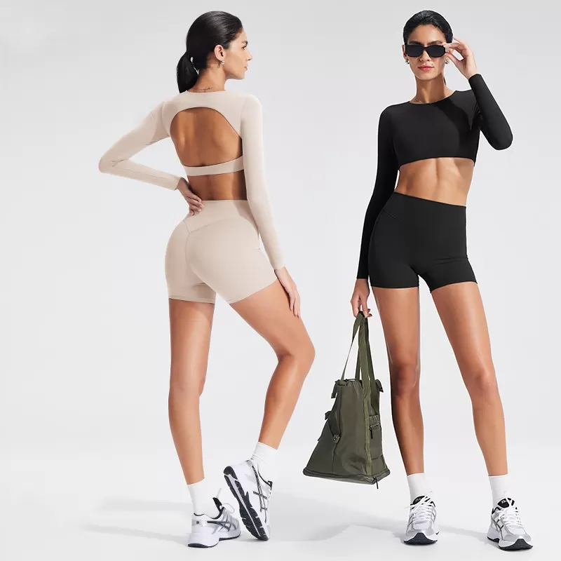 Top deportivo de yoga transpirable de manga larga con espalda descubierta, confeccionado en spandex/nylon, de corte ajustado, ideal para correr, entrenar y hacer ejercicio FGBYT1363