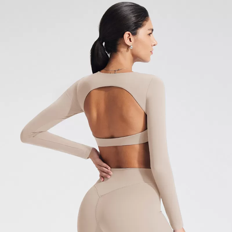 Top deportivo de yoga transpirable de manga larga con espalda descubierta, confeccionado en spandex/nylon, de corte ajustado, ideal para correr, entrenar y hacer ejercicio FGBYT1363