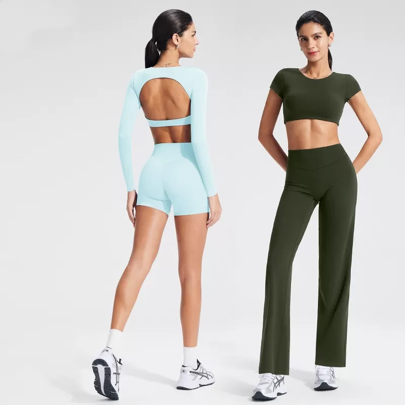 ¡Novedad! Top corto de yoga para gimnasio, entrenamiento y fitness. ¡En oferta! Top de yoga suave, sin espalda y de manga corta para mujer. Logotipo personalizado. Modelo FGBYT1341