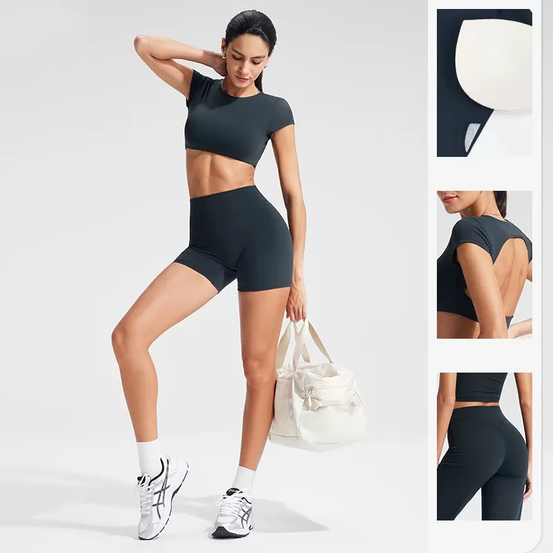 ¡Novedad! Top corto de yoga para gimnasio, entrenamiento y fitness. ¡En oferta! Top de yoga suave, sin espalda y de manga corta para mujer. Logotipo personalizado. Modelo FGBYT1341