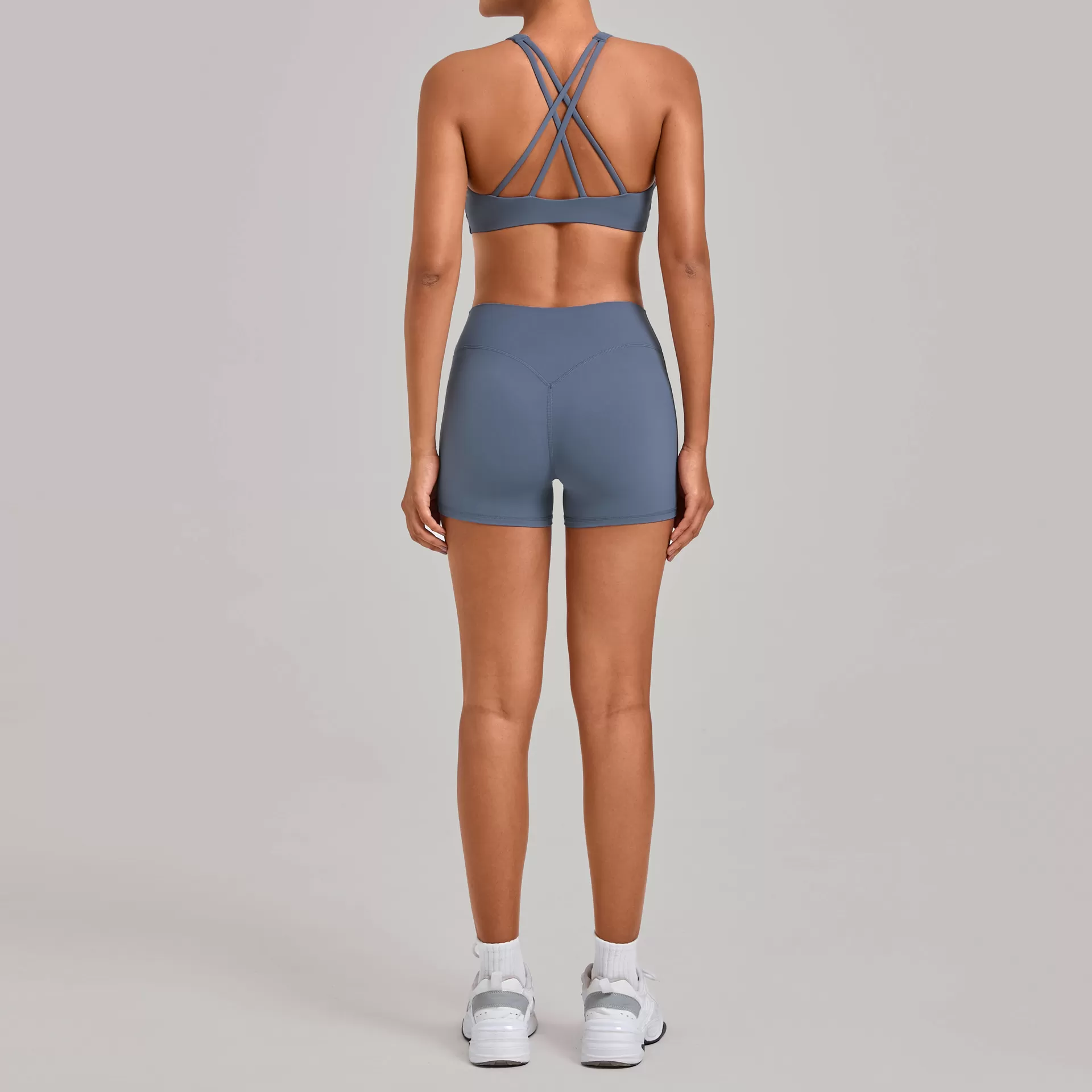 Conjunto deportivo de dos piezas para mujer con cintura elástica y pantalones cortos de yoga color piel FGB16786+10160