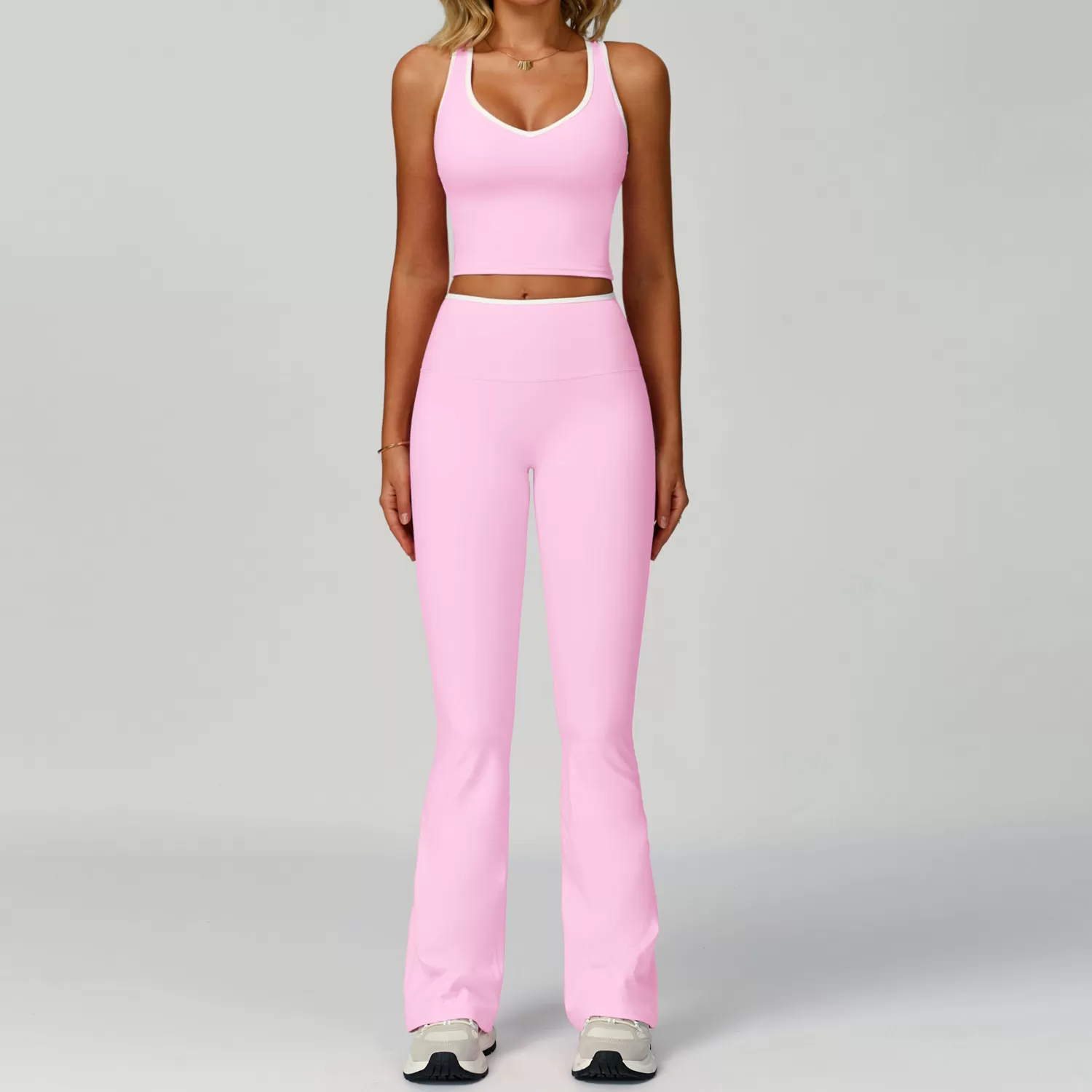 Conjunto de camiseta y pantalón rosa bebé