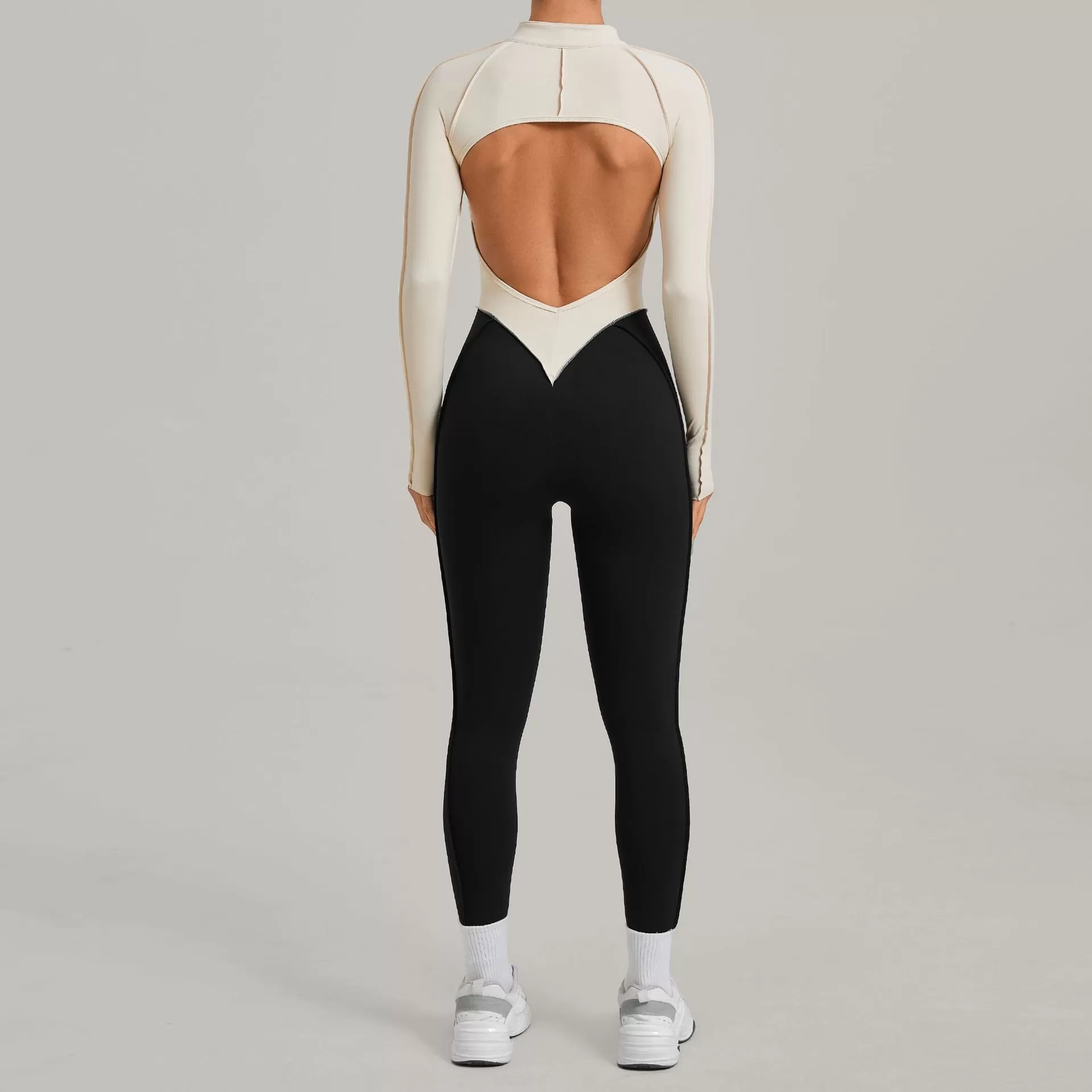 Mono deportivo de manga larga de spandex para mujer, ideal para yoga, gimnasio y entrenamiento, con cremallera FGB16617