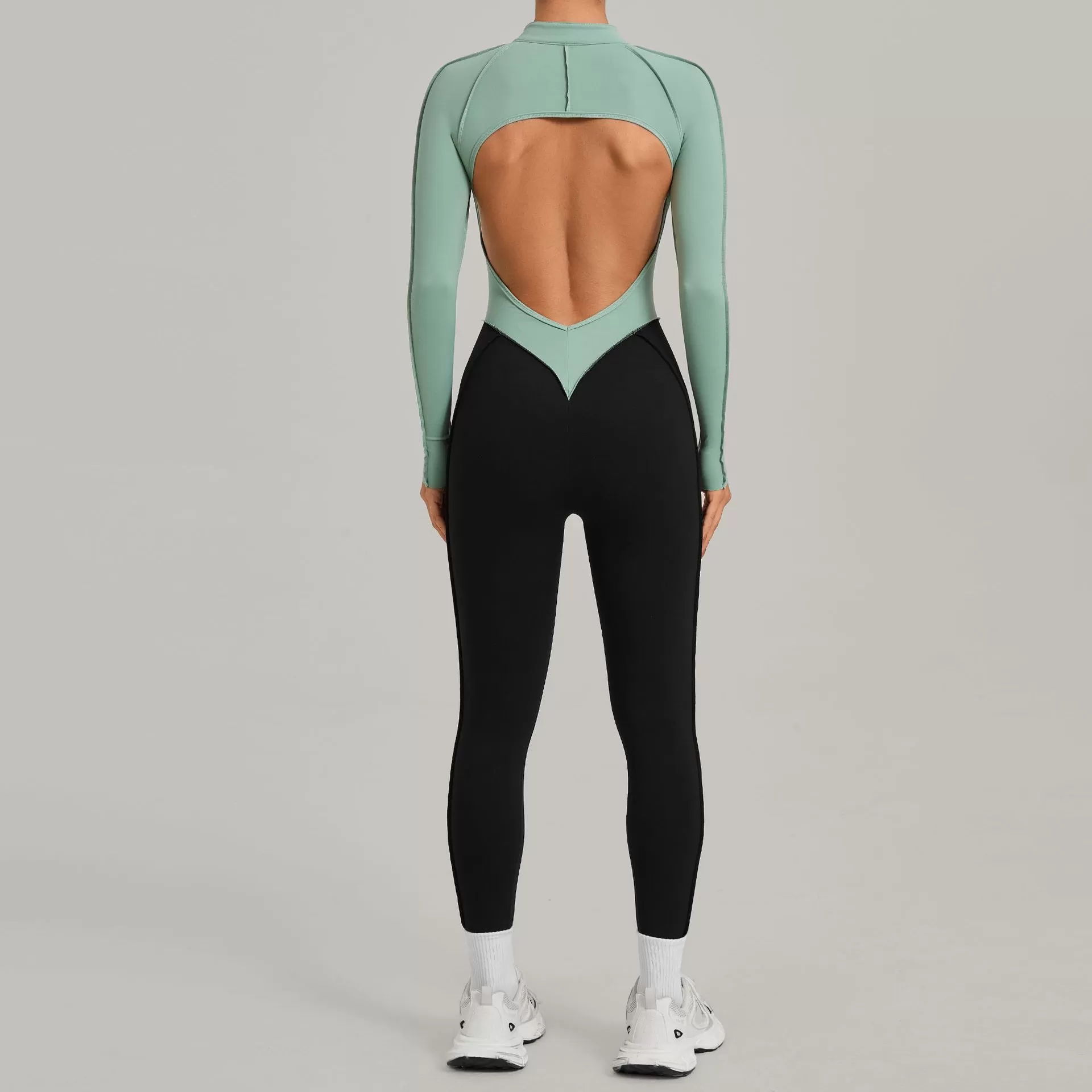 Mono deportivo de manga larga de spandex para mujer, ideal para yoga, gimnasio y entrenamiento, con cremallera FGB16617