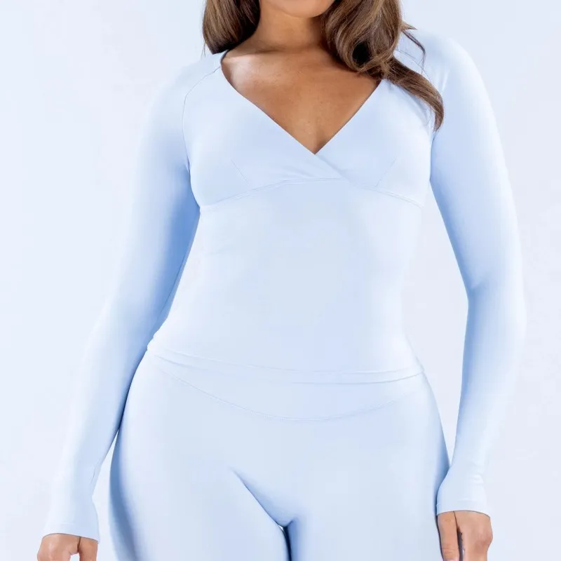 Camiseta deportiva informal de manga larga con escote en V profundo para mujer, ideal para entrenamientos y pilates (FGBRXW3013)