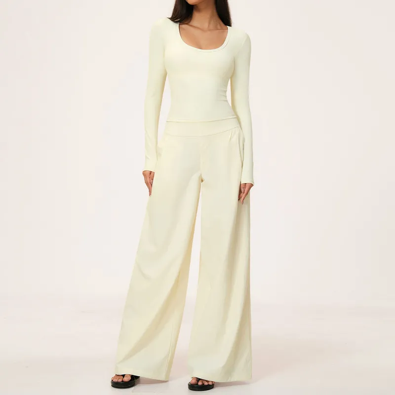 Conjunto de blusa y pantalón de manga larga color crema (2 unidades)
