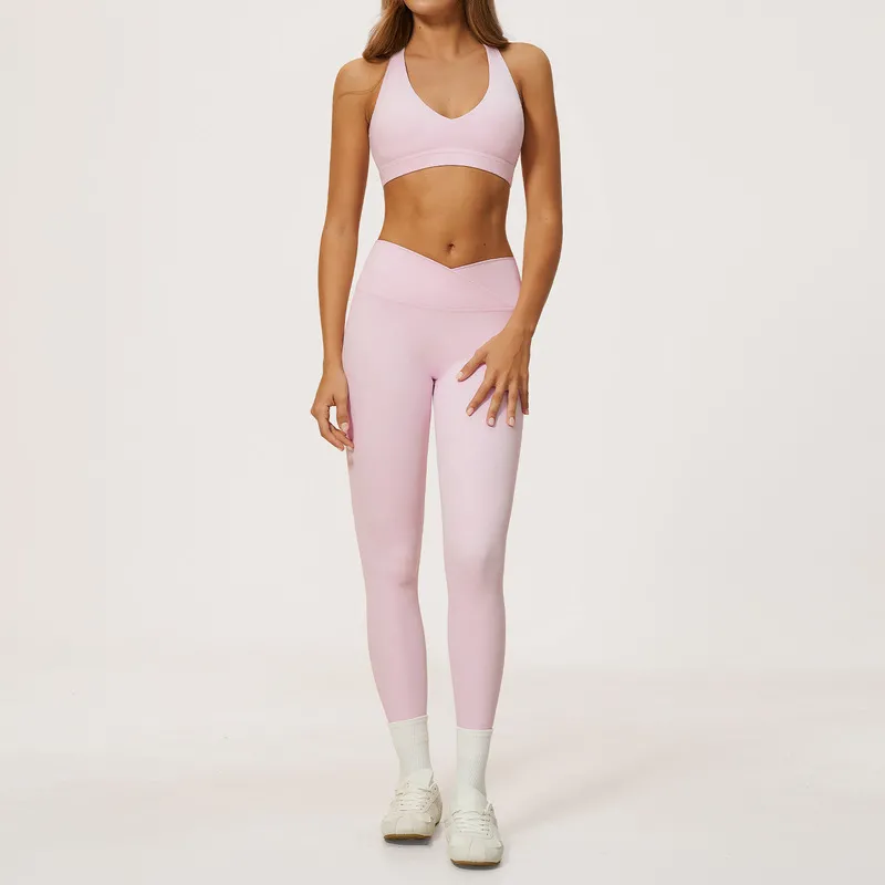 Sujetador y leggings rosa bebé
