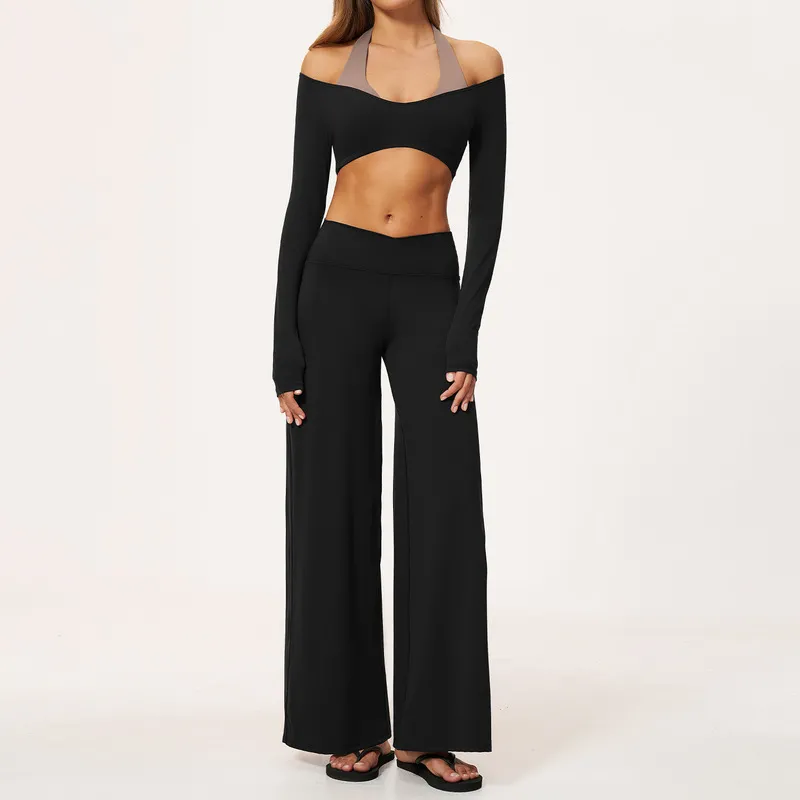 Conjunto de top de manga larga negro y pantalón