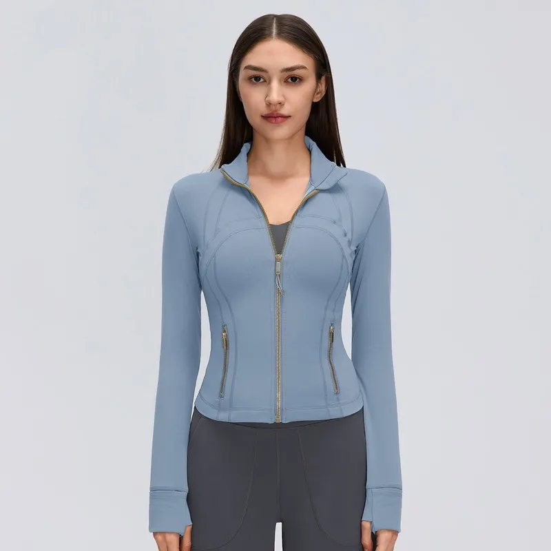 Chaqueta deportiva para mujer, ideal para correr, entrenar y hacer ejercicio en el gimnasio; cuenta con cierre completo, bolsillos con cremallera y aberturas para los pulgares (modelo FGBD26161)