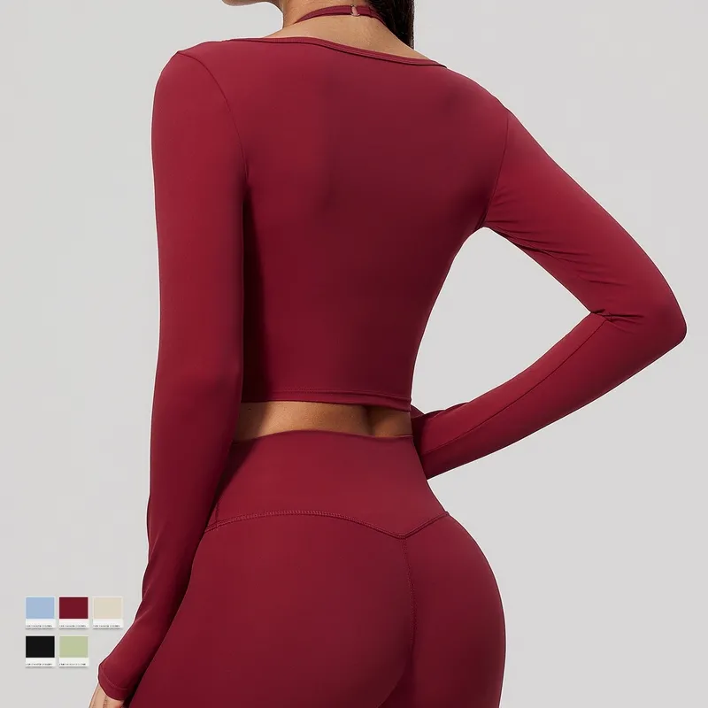Top de yoga para mujer, de manga larga, ajustado, de nailon y elastano, diseño sencillo y liso con detalle plisado FGBFCX5529